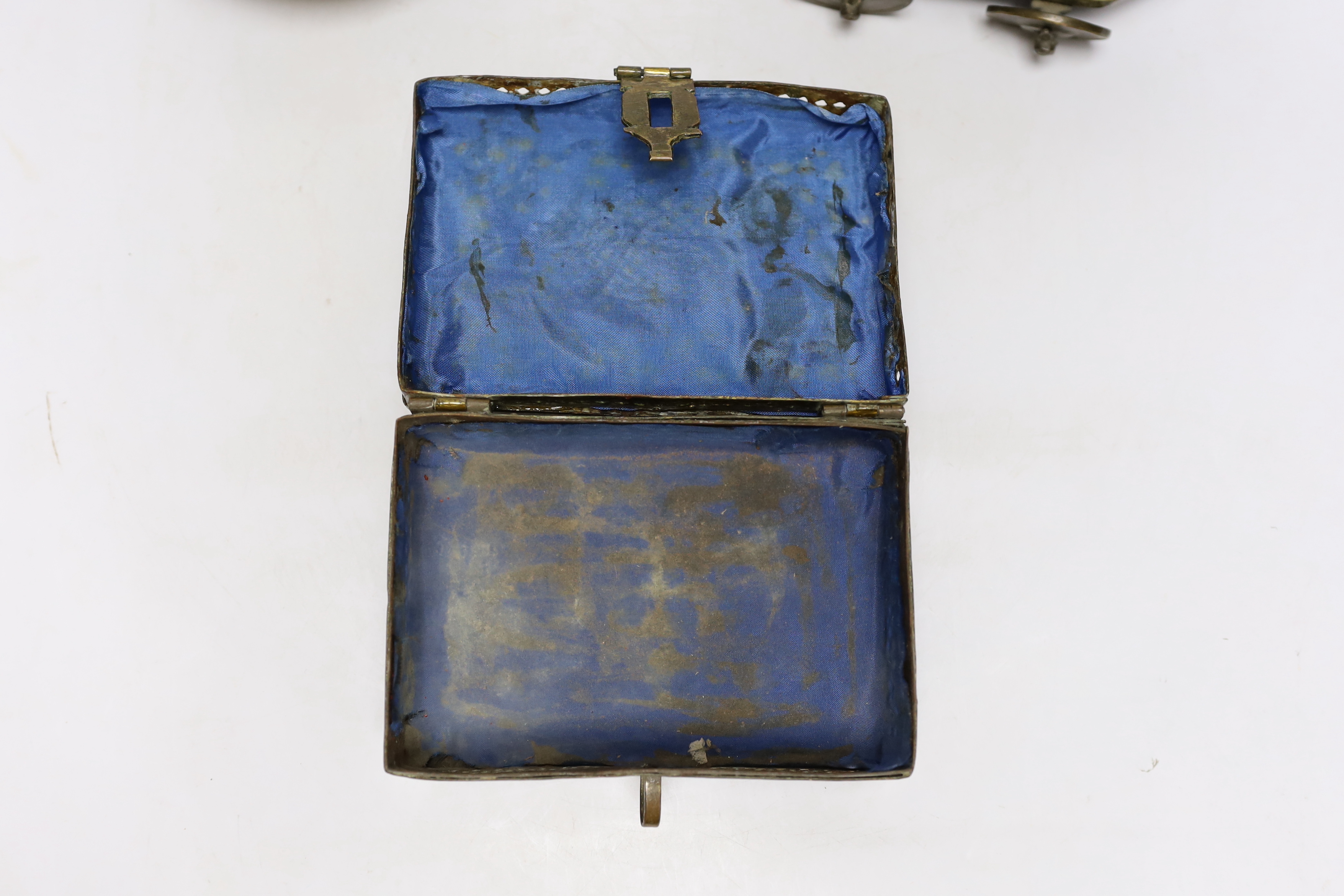 Eastern brassware to include a betel box on wheels, a vase with engraved detail and a pierced box, tallest 15.5cm (3)
